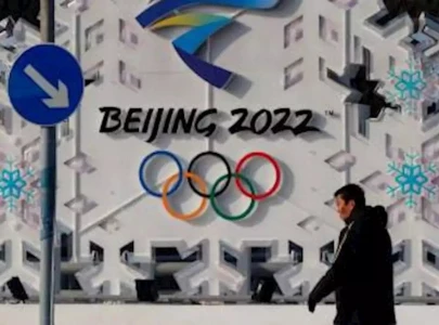 beijing curbs its enthusiasm for winter olympics