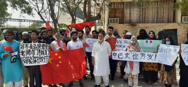 protestors condemning the attack at karachi university photo express protestors condemning the attack at karachi university photo express