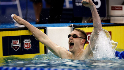 armstrong sets 50m backstroke record