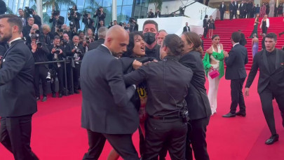 woman storms cannes red carpet to protest ukraine rapes