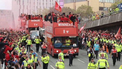 liverpool return to heroes welcome