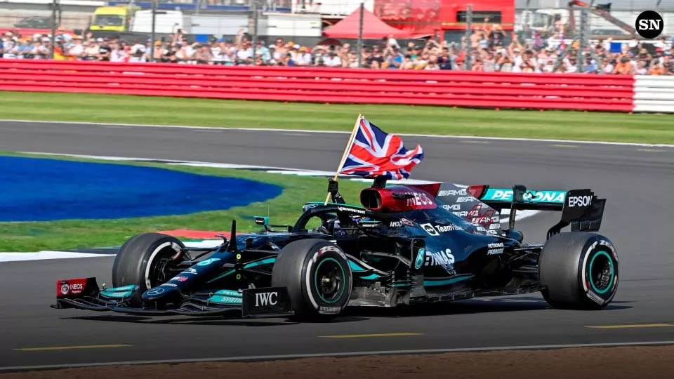 hamilton salutes home crowd and mercedes team hamilton salutes home crowd and mercedes team