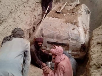 taliban dig up mullah omar s vehicle