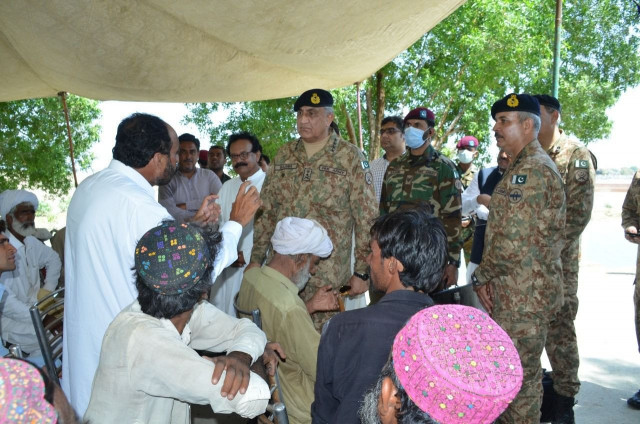 chief of army staff coas general qamar javed bajwa meets flood victims at rojhan in punjab on september 1 2022 photo ispr