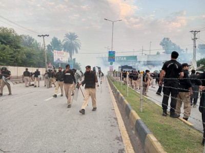 scores injured as protesting teachers clash with police in peshawar