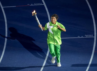 athlete sana carries torch wins hearts athlete sana carries torch wins hearts