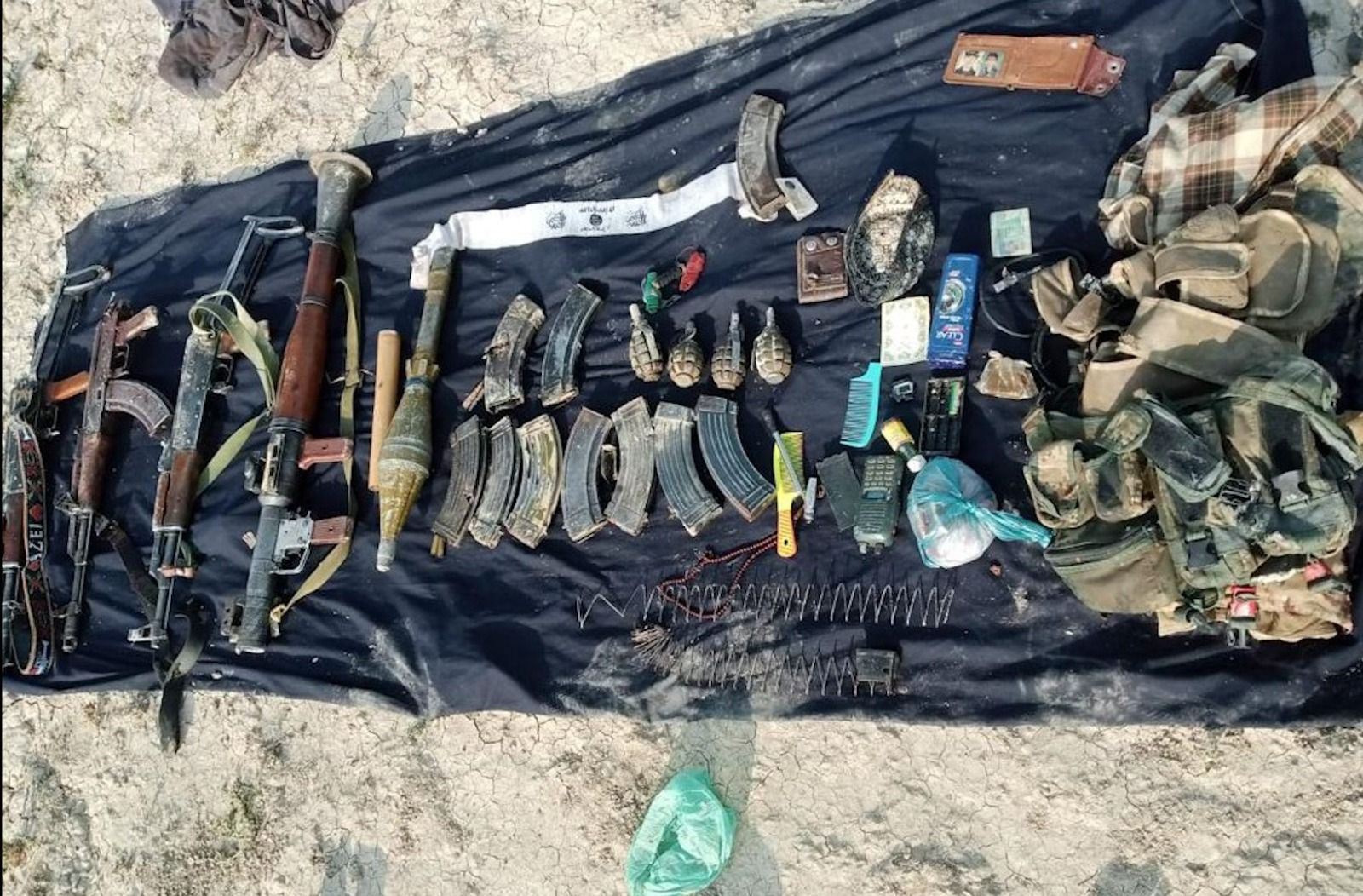 handout photo shows weapons and ammunition also recovered from the terrorists who were wanted for an attack on police last year resulting in the martyrdom of five constables photo ispr