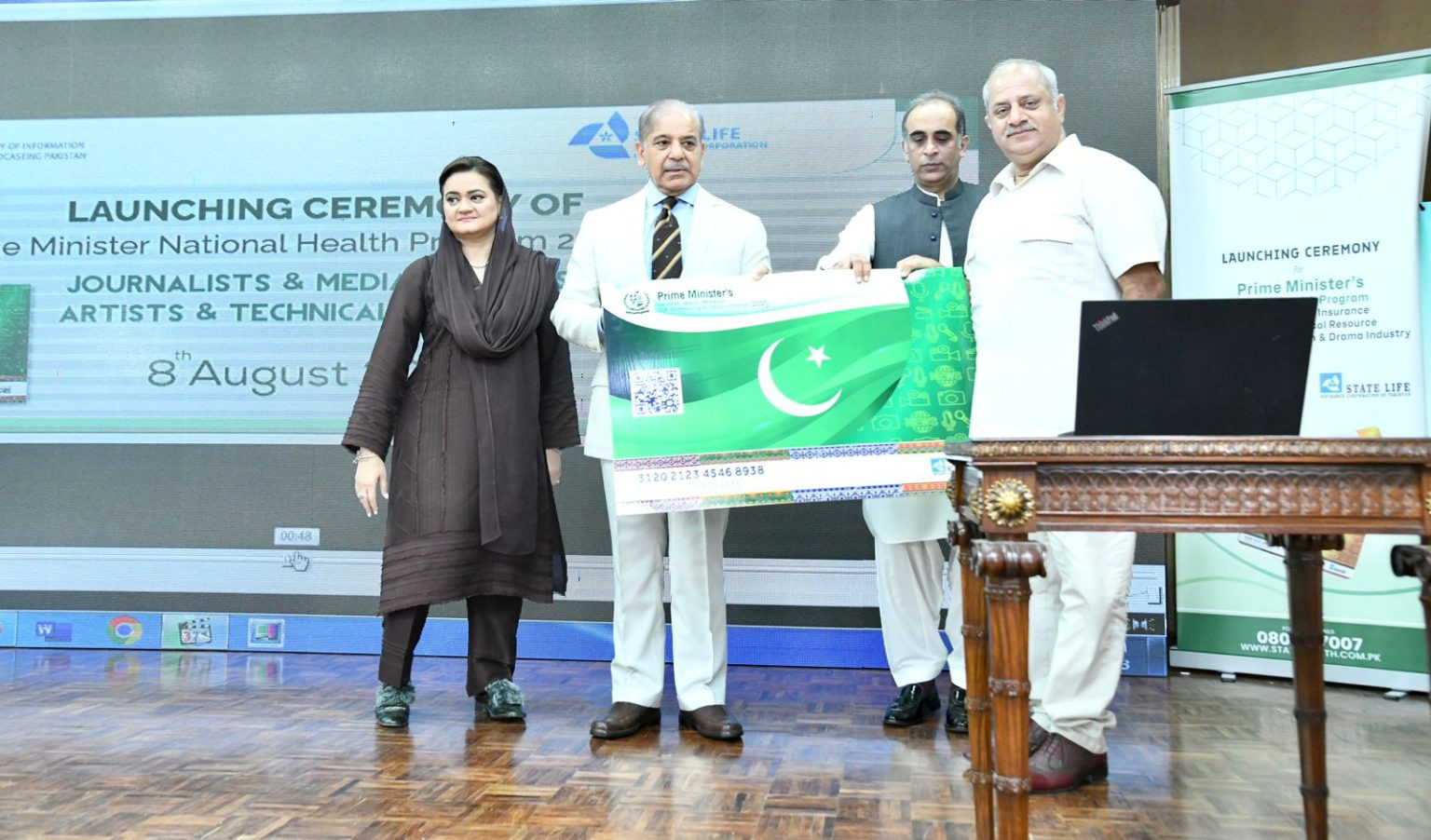 prime minister shehbaz sharif distributes health insurance cards among working journalists media workers artists and technical resource workers in islamabad on august 8 2023 photo app