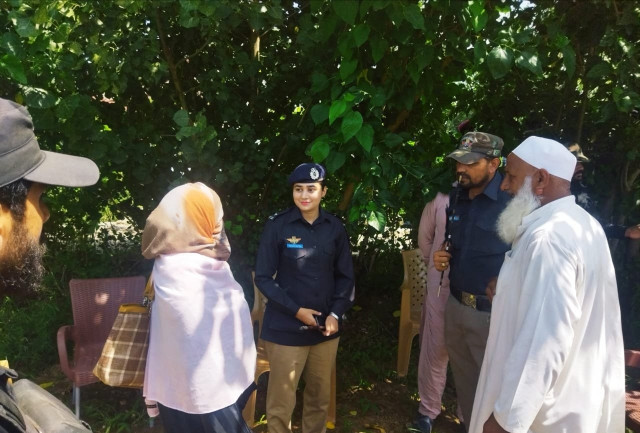 female k p cop helps widow reclaim encroached land