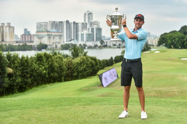 puig clinches malaysian open golf title puig clinches malaysian open golf title