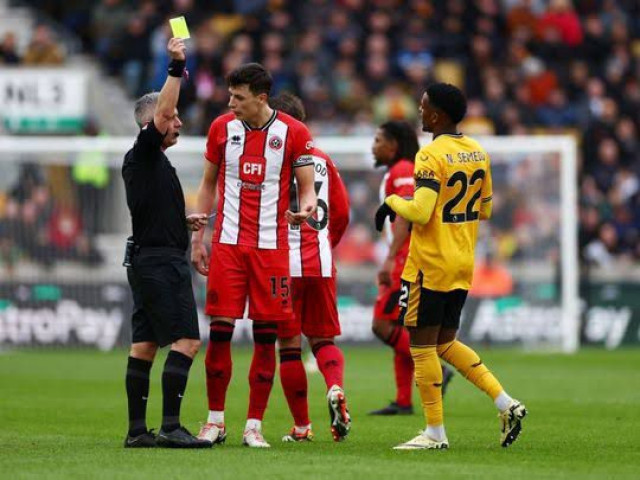 sheffield united players square off in defeat at wolves