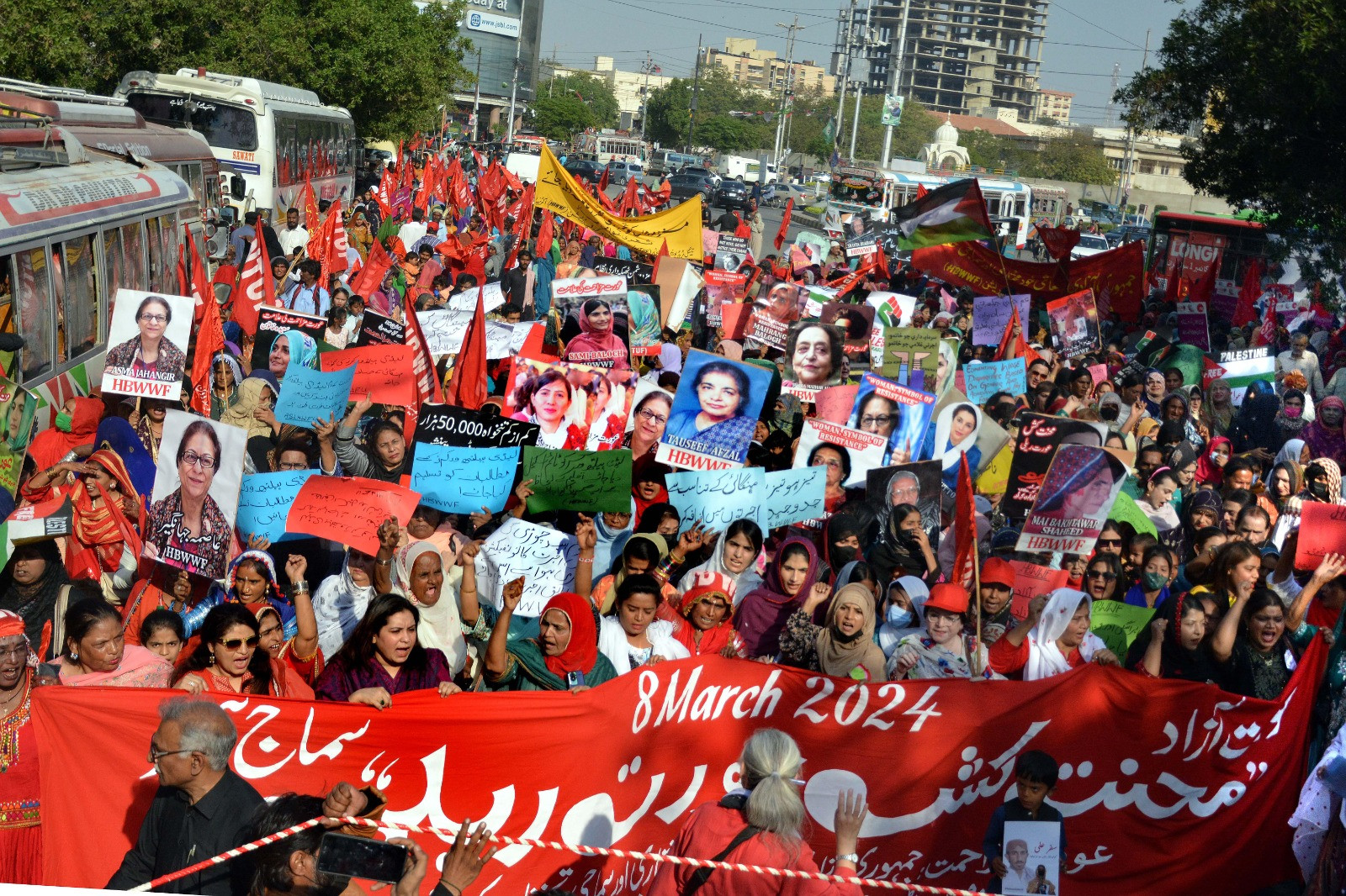 working women stage a march for equal wages and a better working environment on international women s day in karachi on thursday photo jala qureshi express