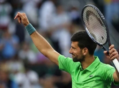 djokovic claws out win in return to indian wells