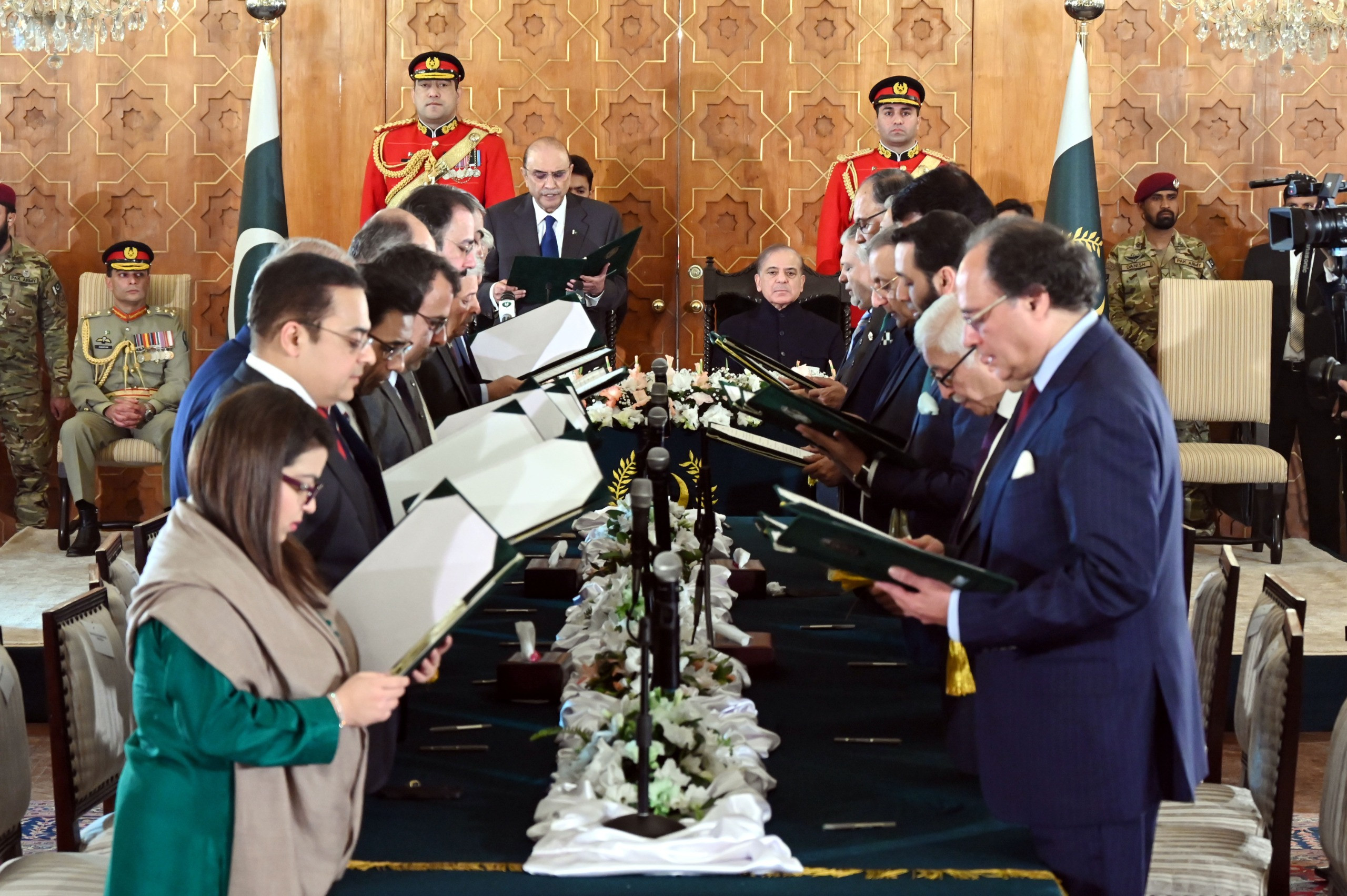 president asif ali zardari administering oath of office to members of federal cabinet at aiwan e sadr in islamabad on march 11 2024 photo pid