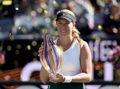 collins triumphs again with title in charleston