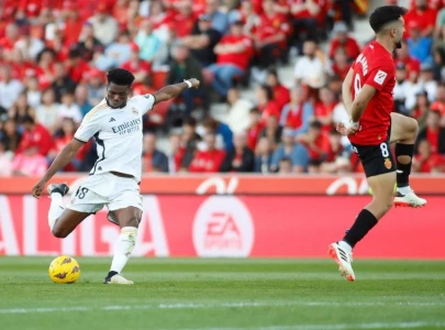 madrid see off mallorca to stay on title course madrid see off mallorca to stay on title course