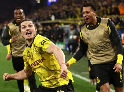dortmund sink atletico to reach champions league semi finals