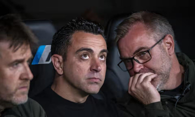xavi to remain barcelona coach