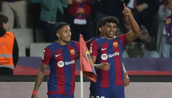barcelona beat real sociedad to move second