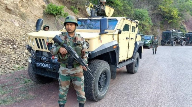 indian army personnel look on during a search operation in reasi on june 10 2024 photo afp indian army personnel look on during a search operation in reasi on june 10 2024 photo afp