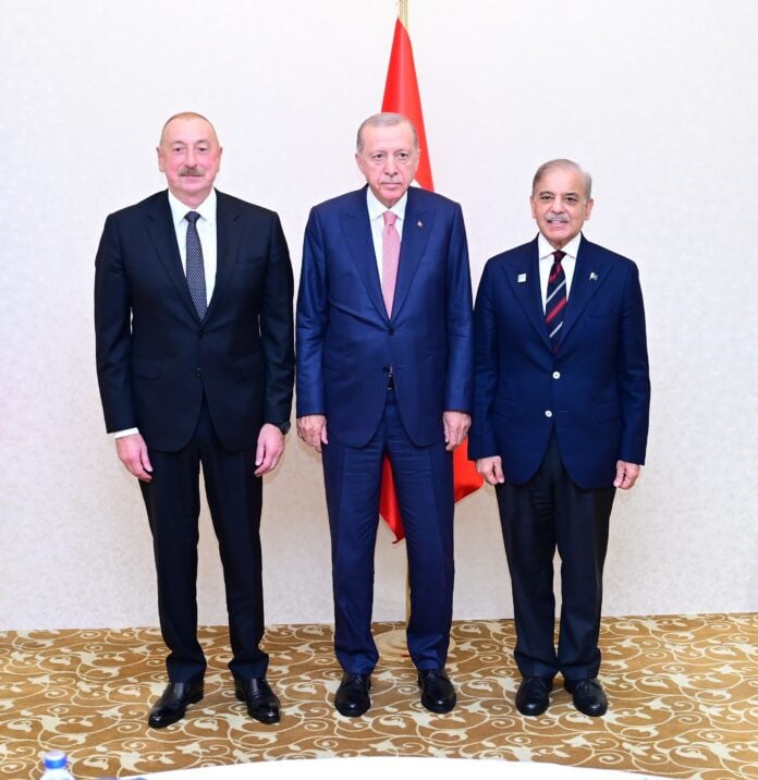 pm shehbaz sharif in a group photo with the turkish president recep tayyib erdogan and azerbaijani president ilham aliyev on the occasion of an inaugural session of pakistan turkiye azerbaijan trilateral meeting on the sidelines of shanghai cooperation organisation summit photo app
