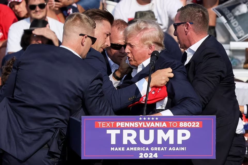 the secret service assists republican presidential candidate and former president donald trump during a campaign rally at the butler farm show in butler pennsylvania july 13 2024 photo reuters
