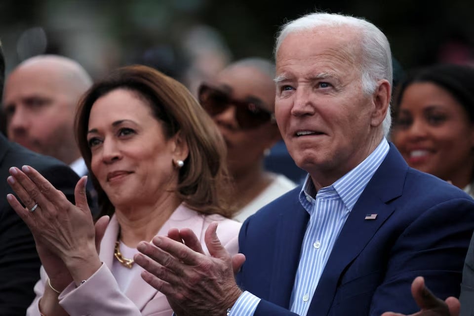 us president joe biden claps hands next to vice president kamala harris while hosting a juneteenth concert on the south lawn at the white house in washington dc on june 10 2024 photo reuters
