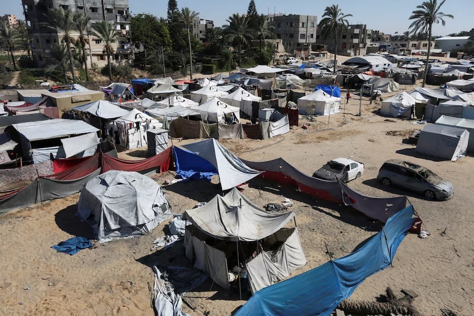 palestinians shelter in a tent camp which was recently attacked in israeli strikes amid the israel hamas conflict in khan younis in the southern gaza strip july 18 2024 photo reuters