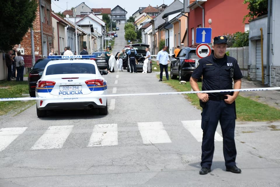 a police officer stands guard as police secure a crime scene in daruvar croatia on july 22 2024 photo reuters