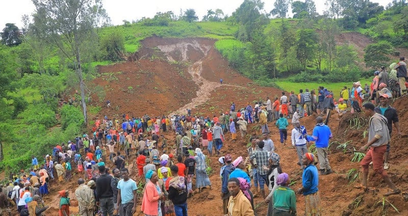 hundreds of people gather at the site of a mudslide in southern ethiopia photo reuters screengrab