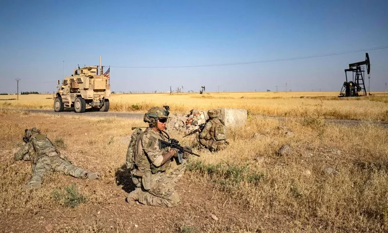 us troops patrol near an oil field in north eastern syria last year photo afp us troops patrol near an oil field in north eastern syria last year photo afp