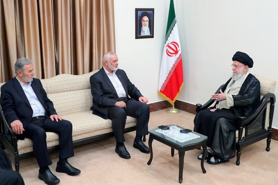 iran s supreme leader ayatollah ali khamenei meets with palestinian group hamas top leader ismail haniyeh and palestinian islamic jihad chief ziad al nakhala in tehran iran july 30 2024 photo reuters