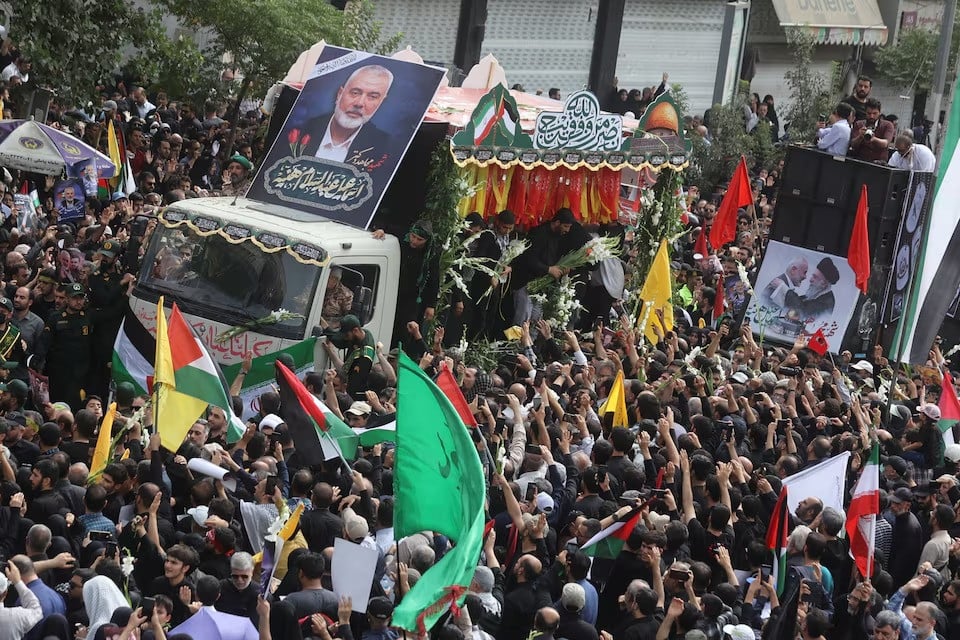 iranians attend the funeral procession of assassinated hamas chief ismail haniyeh in tehran iran august 1 2024 photo reuters