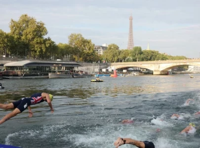 olympic athletes fall ill after swimming in paris seine river olympic athletes fall ill after swimming in paris seine river