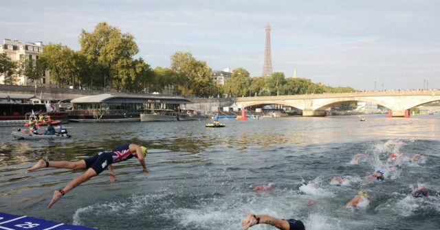 olympic athletes fall ill after swimming in paris seine river olympic athletes fall ill after swimming in paris seine river