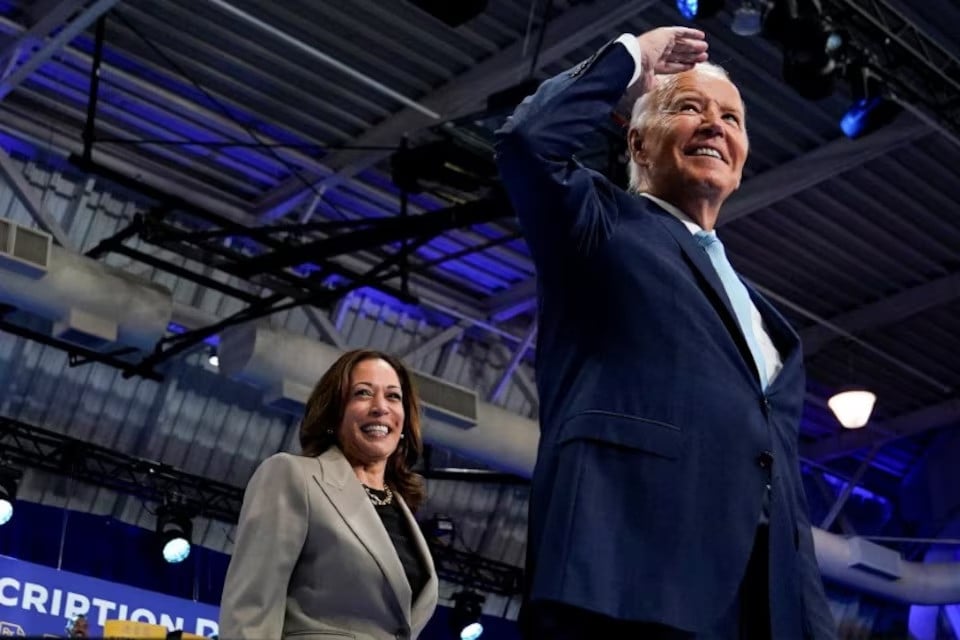 us president joe biden gestures as he walks with vice president kamala harris before delivering remarks on medicare drug price negotiations at an event in prince george s county maryland us august 15 2024 photo reuters