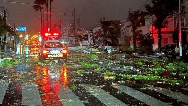 a police car drives amid destruction from typhoon shanshan in miyazaki city in japan on august 29 2024 photo reuters a police car drives amid destruction from typhoon shanshan in miyazaki city in japan on august 29 2024 photo reuters