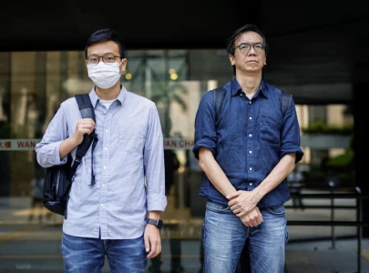 hong kong court convicts two journalists of conspiring to publish seditious articles