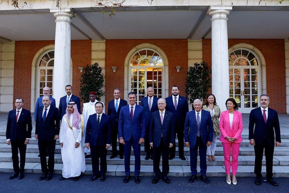 spain s prime minister pedro sanchez poses for a photo with spain s foreign minister jose manuel albares spain s secretary general for foreign affairs emma aparici european union foreign policy chief josep borrell palestinian prime minister mohammad mustafa saudi arabia s foreign minister prince faisal bin farhan al saud jordan s foreign minister ayman safadi slovenian foreign minister tanja fajon norway s foreign minister espen barth eide turkey s foreign minister hakan fidan egypt s foreign minister badr abdelatty secretary general of the arab league ahmed aboul gheit secretary general of the organisation of islamic cooperation hissein brahim taha qatar s minister of state mohammed bin abdulaziz al khulaifi bahrain s undersecretary of the ministry of foreign affairs for political affairs shaikh abdulla bin ahmed al khalifa and ireland s un policy director and director of the un security council task team gerard keown on the day of a meeting at moncloa palace in madrid spain on september 13 2024 photo reuters