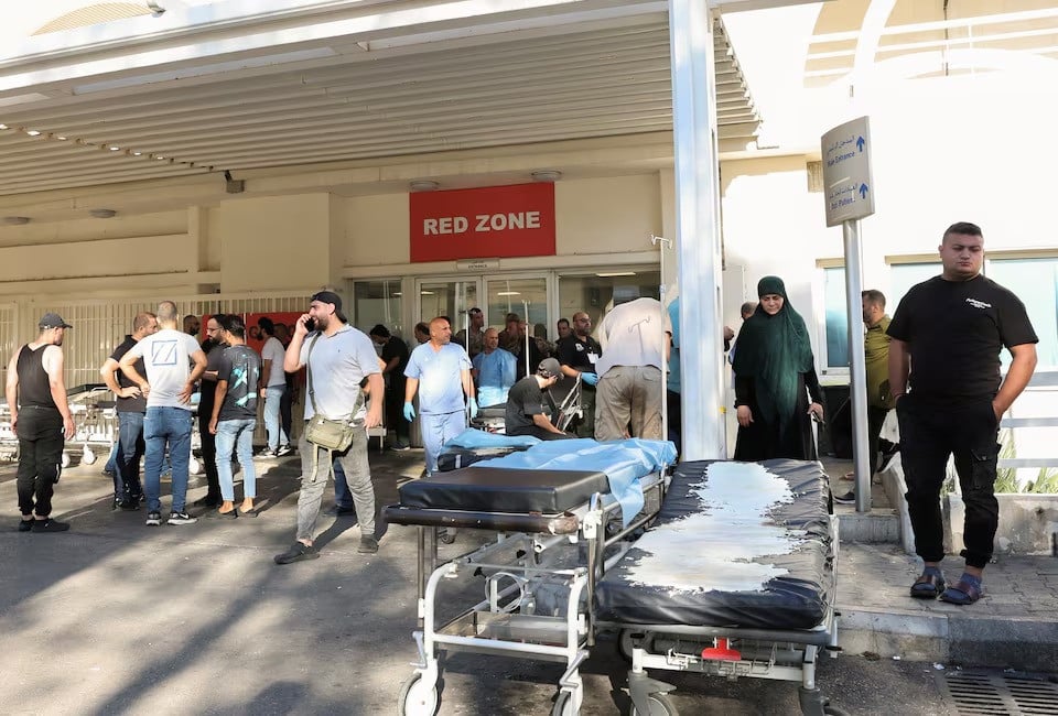 people gather outside a hospital as hundreds of members of the lebanese armed group hezbollah including fighters and medics were seriously wounded on tuesday when the pagers they use to communicate exploded according to a security source in beirut lebanon september 17 2024 photo reuters