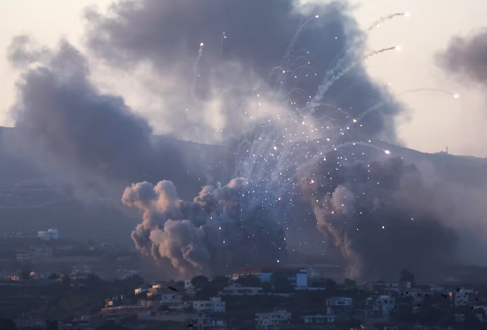 smoke billows over southern lebanon following israeli strikes amid ongoing cross border hostilities between hezbollah and israeli forces as seen from tyre in southern lebanon on september 23 photo reuters