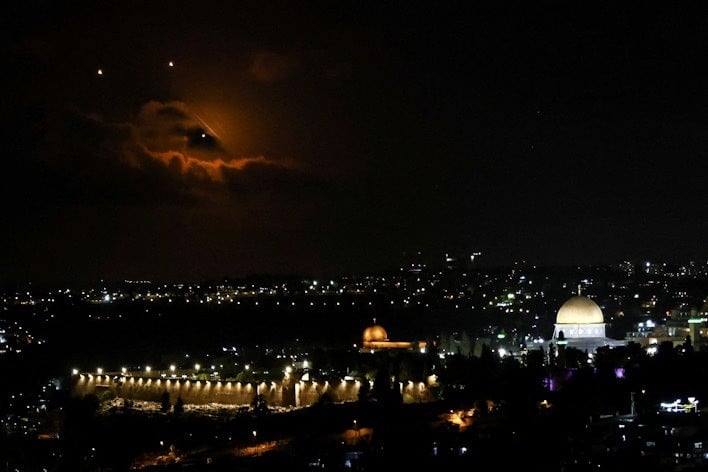 the dome of the rock on the al aqsa compound is seen as projectiles fly through the sky after iran fired a salvo of ballistic missiles at israel as seen from jerusalem on october 1 2024 photo reuters