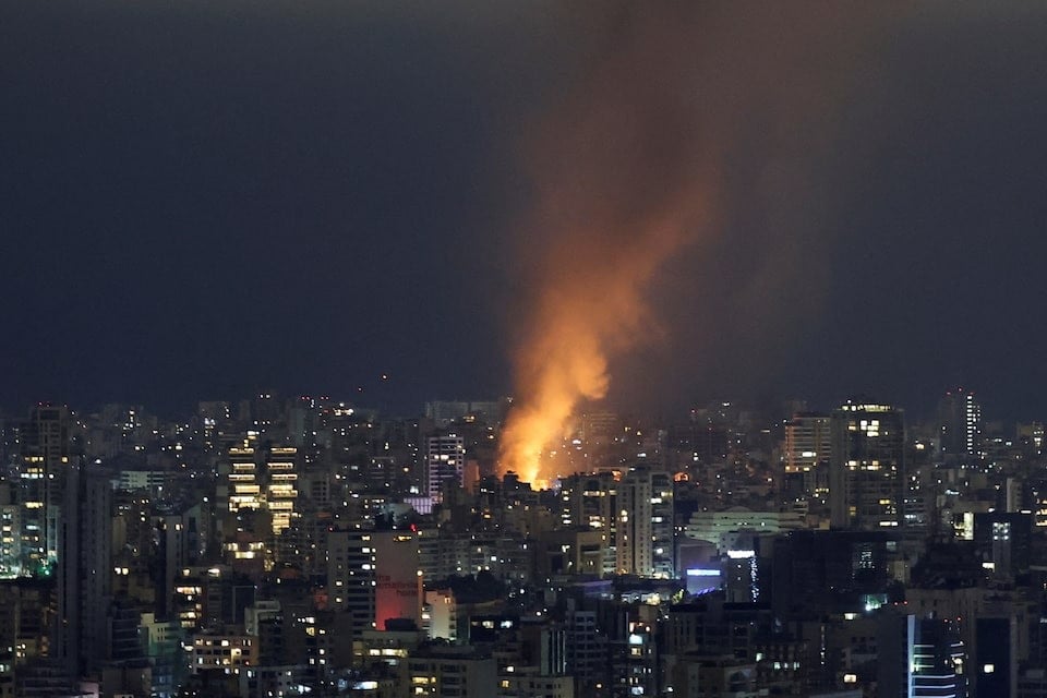 smoke and fire rise over beirut after israeli air strikes amid ongoing hostilities between hezbollah and israeli forces as seen from sin el fil lebanon on october 10 2024 photo reuters