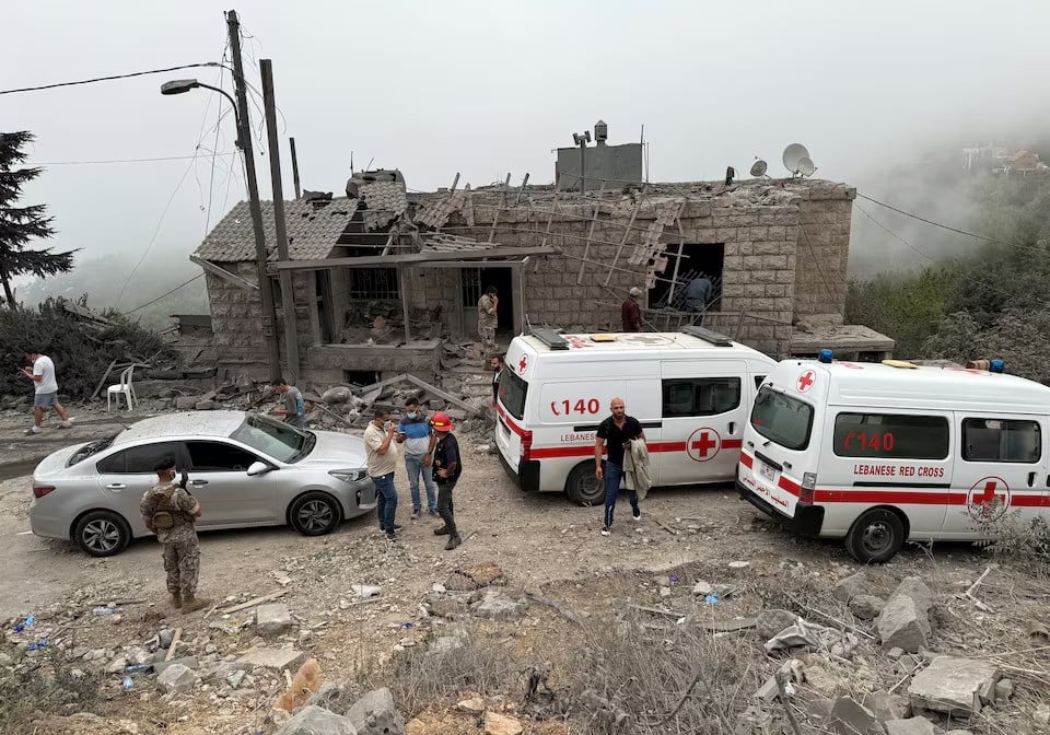 lebanese red cross vehicles are parked at a site damaged by an israeli air strike in the christian majority region of aitou in north lebanon the lebanese health ministry said october 14 2024 photo reuters