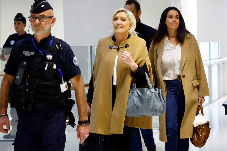 french far right leader marine le pen arrives to attend trial at the courthouse in paris france on october 14 2024 photo reuters