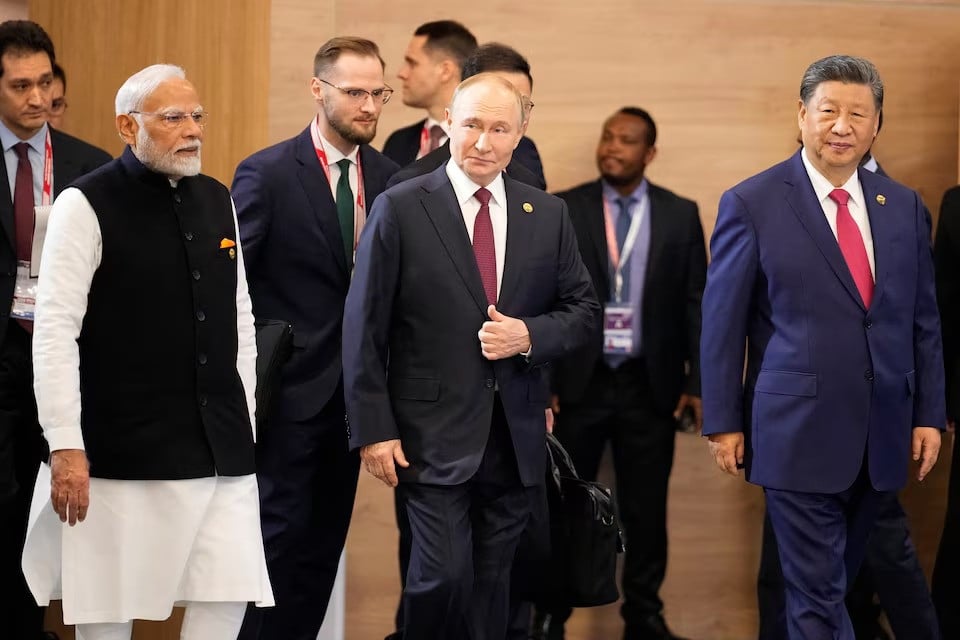 indian prime minister narendra modi russian president vladimir putin and chinese president xi jinping attend a family photo ceremony prior to the brics summit plenary session in kazan russia on october 23 2024 photo reuters