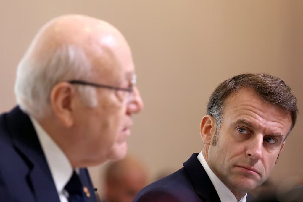 french president emmanuel macron with lebanese prime minister najib mikati during the paris conference on october 24 2024 photo afp