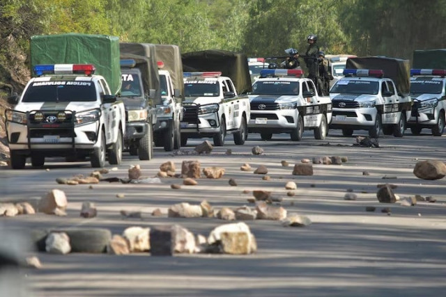 police vehicles line up while attempting to dismantle a blockade set by supporters of bolivia s former president evo morales in protest of the government of president luis arce in parotani bolivia on october 25 2024 photo reuters police vehicles line up while attempting to dismantle a blockade set by supporters of bolivia s former president evo morales in protest of the government of president luis arce in parotani bolivia on october 25 2024 photo reuters