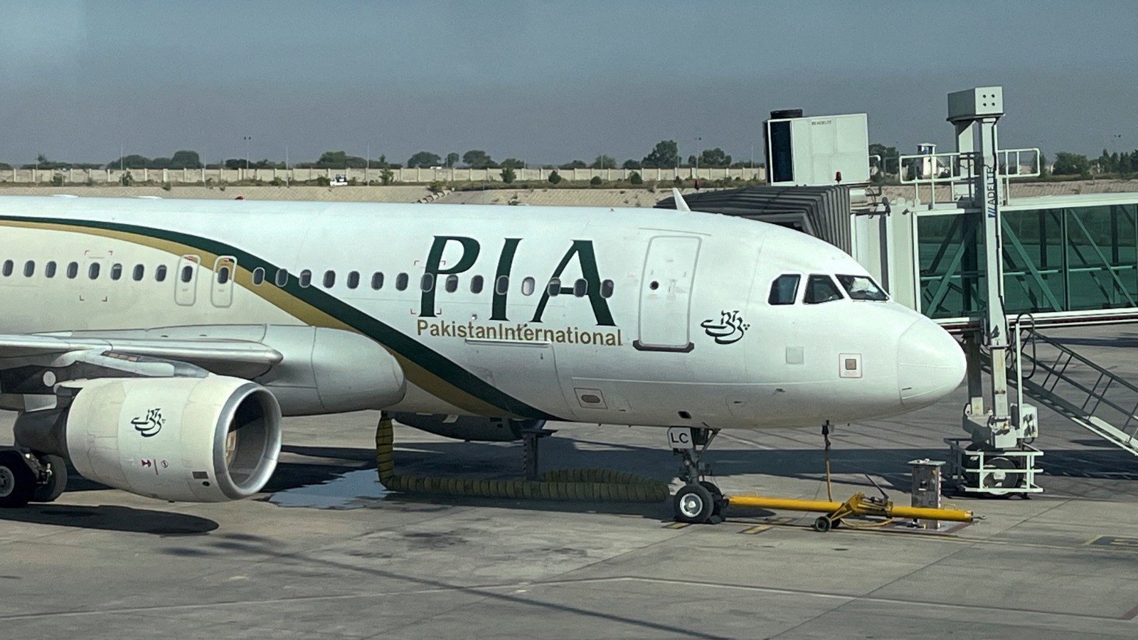 view of the pakistan international airlines pia passenger plane taken through a glass panel at islamabad international airport pakistan on october 3 2023 photo reuters