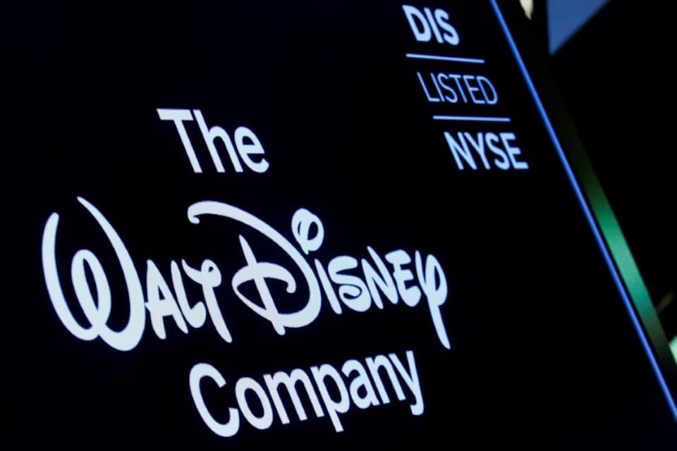 a screen shows the logo and a ticker symbol for the walt disney company on the floor of the new york stock exchange in new york us photo reuters